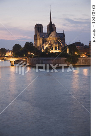 Scenic view of cathedral next to water at night 10370738