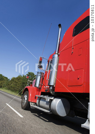 Large red truck on the highway Large red truck on the highway 10370811