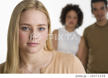 Portrait of young woman with two friends 10371328