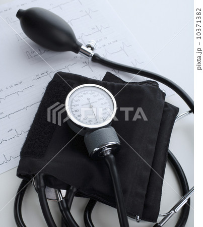 Blood pressure cuff on heart rate printout 10371382