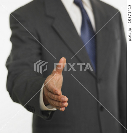 Man offering handshake Man offering handshake 10371418