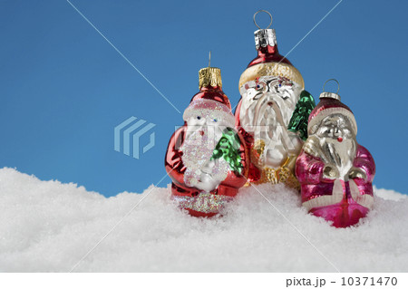 Three Santa Claus Christmas ornanaments 10371470