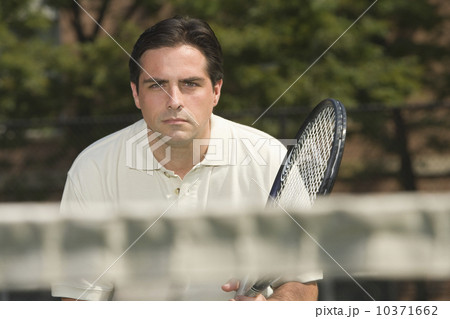 Close up of man playing tennis 10371662