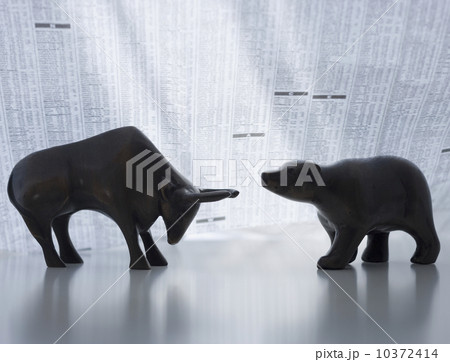 Bear and bull figurines facing each other Bear and bull figurines facing each other 10372414