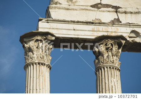 Low angle view of Corinthian columns, Temple of Castor and Pollux, Roman Forum, Italy 10372701