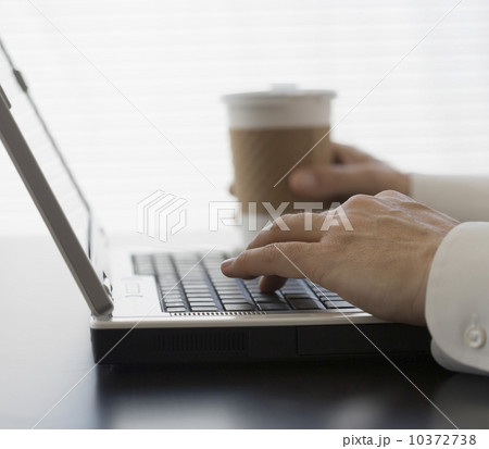Businessman typing on laptop Businessman typing on laptop 10372738