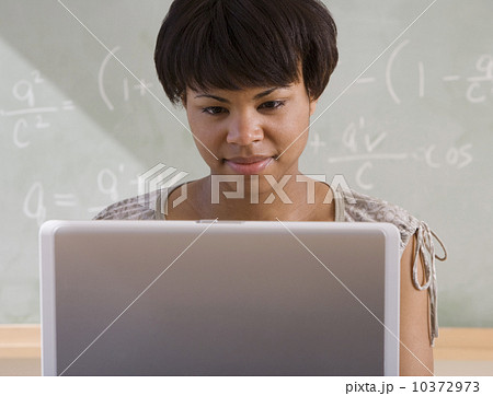 African woman using laptop in classroom African woman using laptop in classroom 10372973