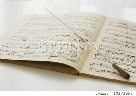 Conductor’s baton on sheet music Conductor’s baton on sheet music 10373056