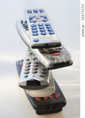 Stack of remote controls Stack of remote controls 10373153