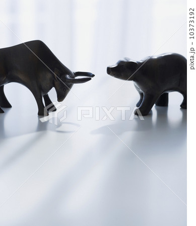 Bear and bull figurines facing each other Bear and bull figurines facing each other 10373192