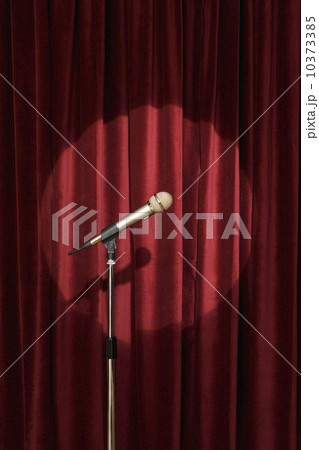 Spotlight on microphone on stage 10373385