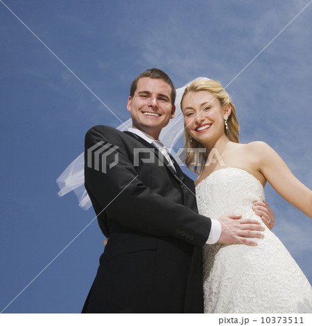Low angle view of bride and groom 10373511