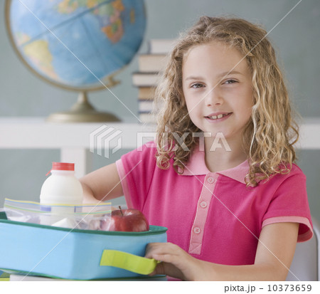 Girl eating lunch at school Girl eating lunch at school 10373659