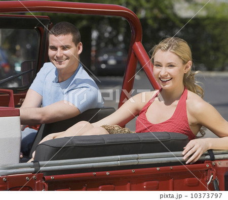 Couple sitting in jeep 10373797