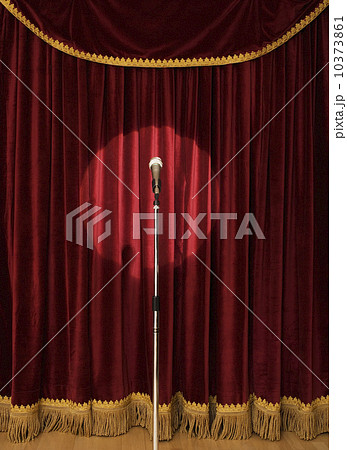 Spotlight on microphone on stage Spotlight on microphone on stage 10373861