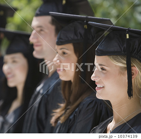 Group of college graduates in row 10374139