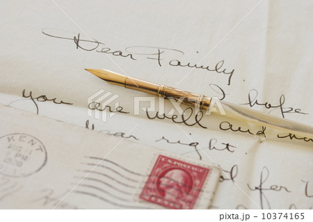 Quill pen on old letter 10374165