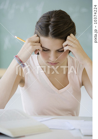 Girl studying in classroom Girl studying in classroom 10374224