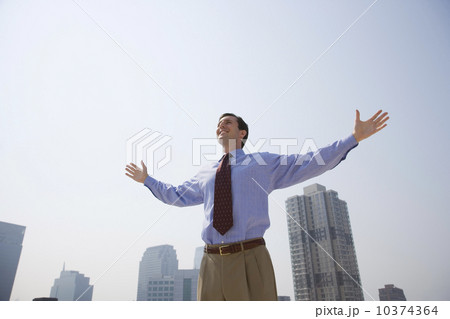 Businessman with arms outstretched 10374364