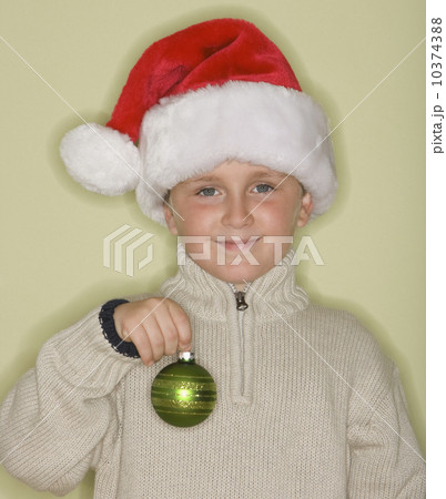 Boy wearing Santa Claus hat 10374388