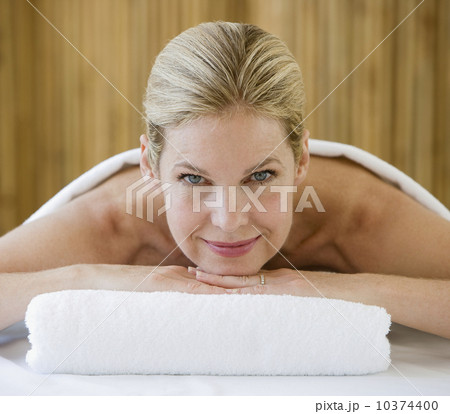 Woman on spa treatment table 10374400