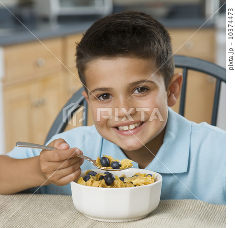 Boy eating cereal 10374473