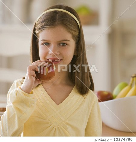 Girl eating apple Girl eating apple 10374790