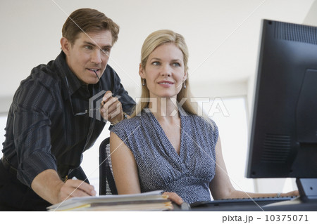 Businessman looking at computer 10375071