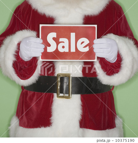 Santa Claus holding Sale sign 10375190