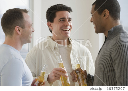 Multi-ethnic men drinking beer Multi-ethnic men drinking beer 10375207
