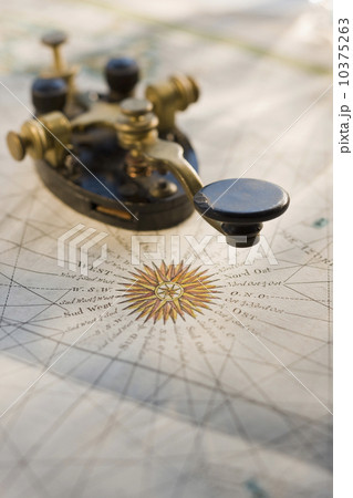 Telegraph key on antique map 10375263