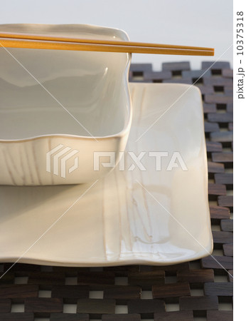 Plate and bowl with chopsticks 10375318