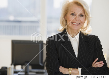 Businesswoman with arms crossed Businesswoman with arms crossed 10375418