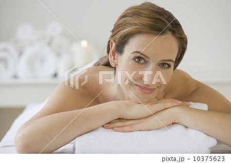 Woman laying on spa table Woman laying on spa table 10375623