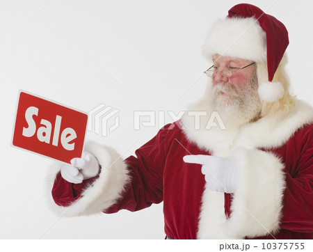 Santa Claus holding Sale sign 10375755