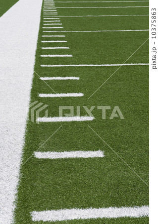 Yard line markers on football field 10375863