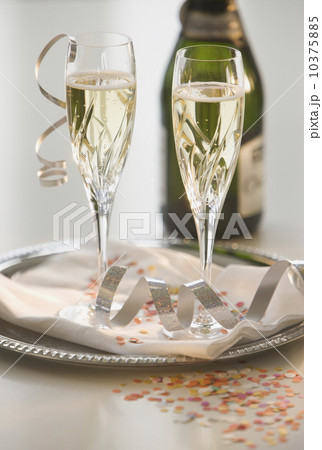 Glasses of champagne on tray Glasses of champagne on tray 10375885