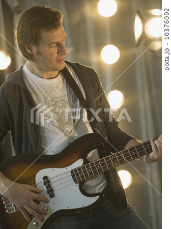 Man playing electric guitar Man playing electric guitar 10376092