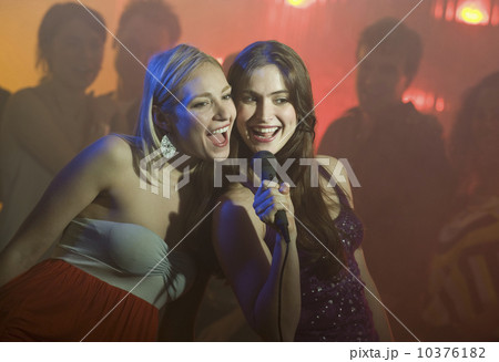 Women singing karaoke 10376182