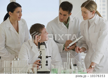 Scientists working together in pharmaceutical laboratory Scientists working together in pharmaceutical laboratory 10376353