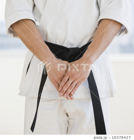 Man wearing karate black belt 10376427