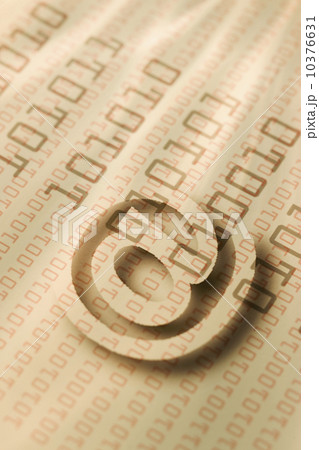 Close up of “at’ symbol and binary code 10376631
