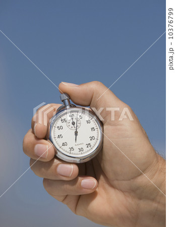 Close up of hand holding stopwatch Close up of hand holding stopwatch 10376799