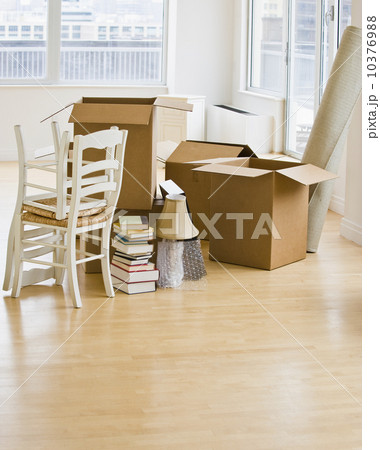 Moving boxes and chairs in livingroom Moving boxes and chairs in livingroom 10376988