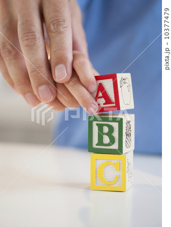 Child playing with ABC blocks 10377479