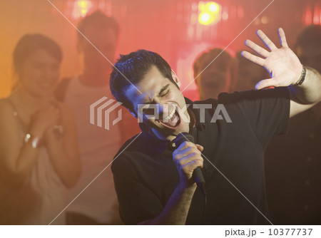 Man singing karaoke 10377737