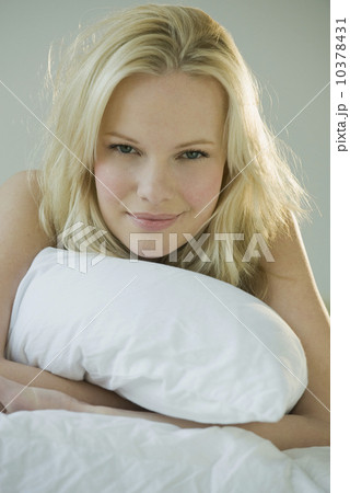 Woman relaxing on bed 10378431