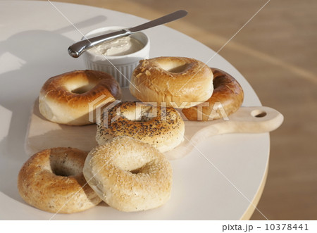 Bagels and creme cheese on table Bagels and creme cheese on table 10378441