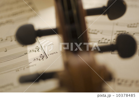 Close up of violin bow on sheet music Close up of violin bow on sheet music 10378485