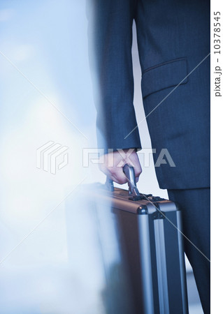 Businessman holding briefcase 10378545